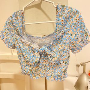 Size Medium light Blue Flower T-shirt, with tie at front- SHEIN.